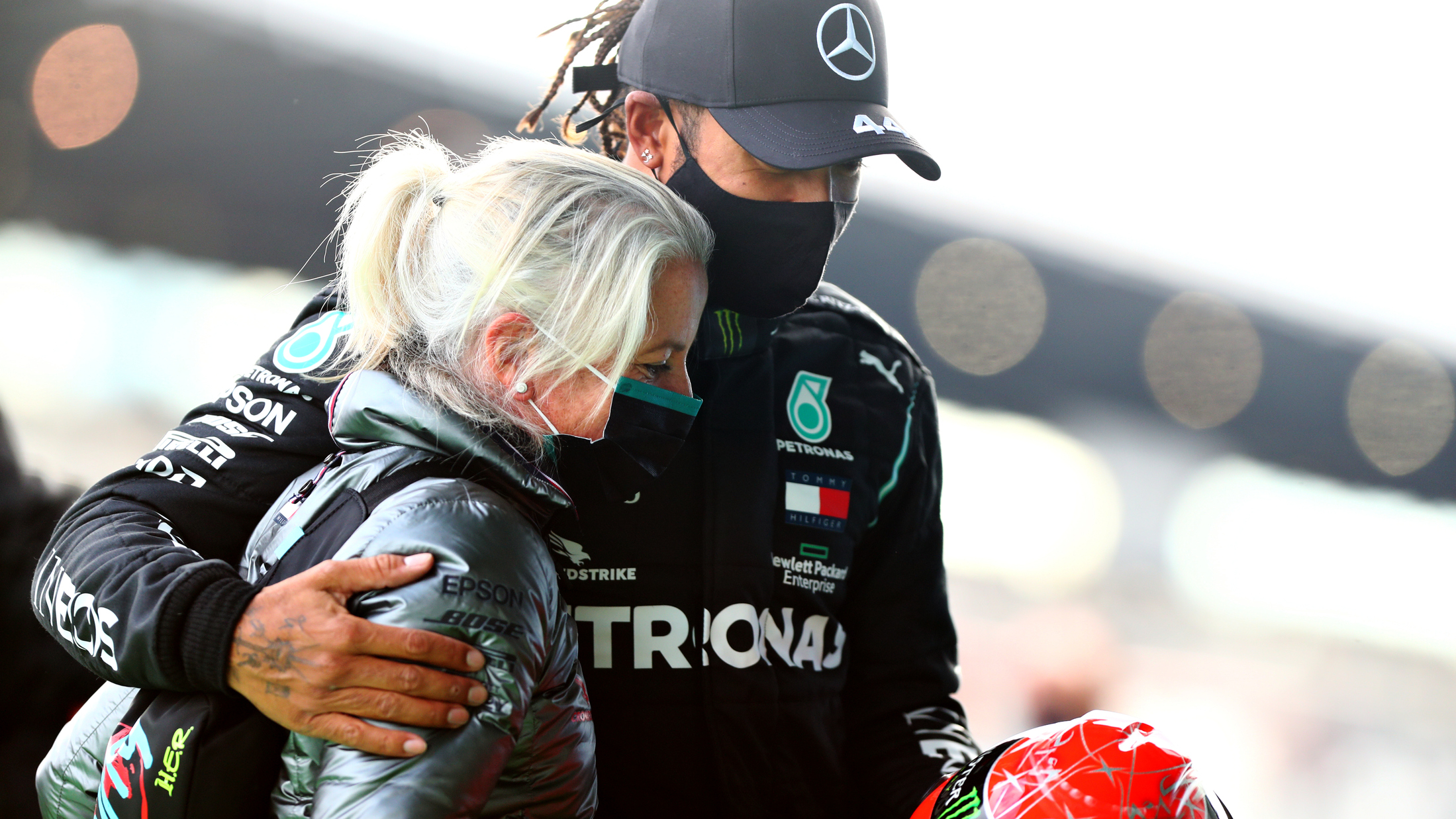 Lewis Hamilton hugging his physiotherapist Angela Cullen after the race